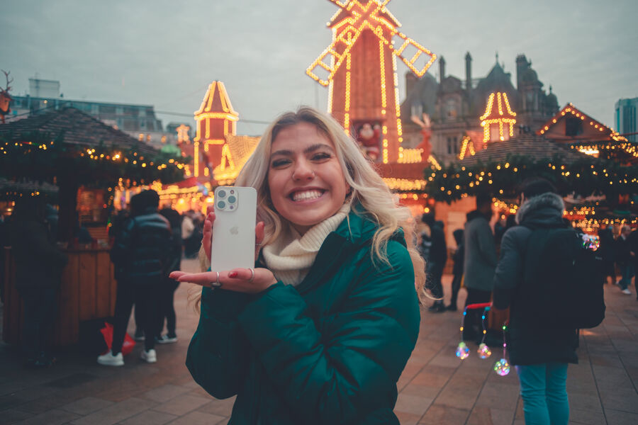 A creator out at a festive London night market
